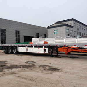 Semi-remorque à plateau plat 4 essieux pour le transport de conteneurs, personnalisable avec un plateau bleu - Product Image 1