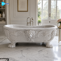 Baignoire en marbre blanc haut de gamme avec tête de lion et gravure en spirale, baignoire autoportante de luxe en pierre pour la décoration des salles de bain d'hôtel