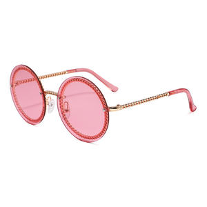 Lunettes de soleil à monture ronde en métal à la mode, protection UV400 pour femmes, verres sur le thème de l'océan, style européen et américain élégant - Product Image 2
