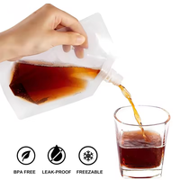 Sacs à buse en plastique transparent avec logo imprimé personnalisé 100ml-500ml en stock Pochette debout avec caractéristiques de sécurité Lait Boissons
