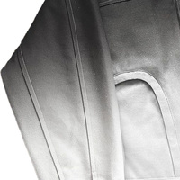 Blouson d'hiver minimaliste pour homme en toile noire et blanche dégradée, fermeture éclair, avec poches