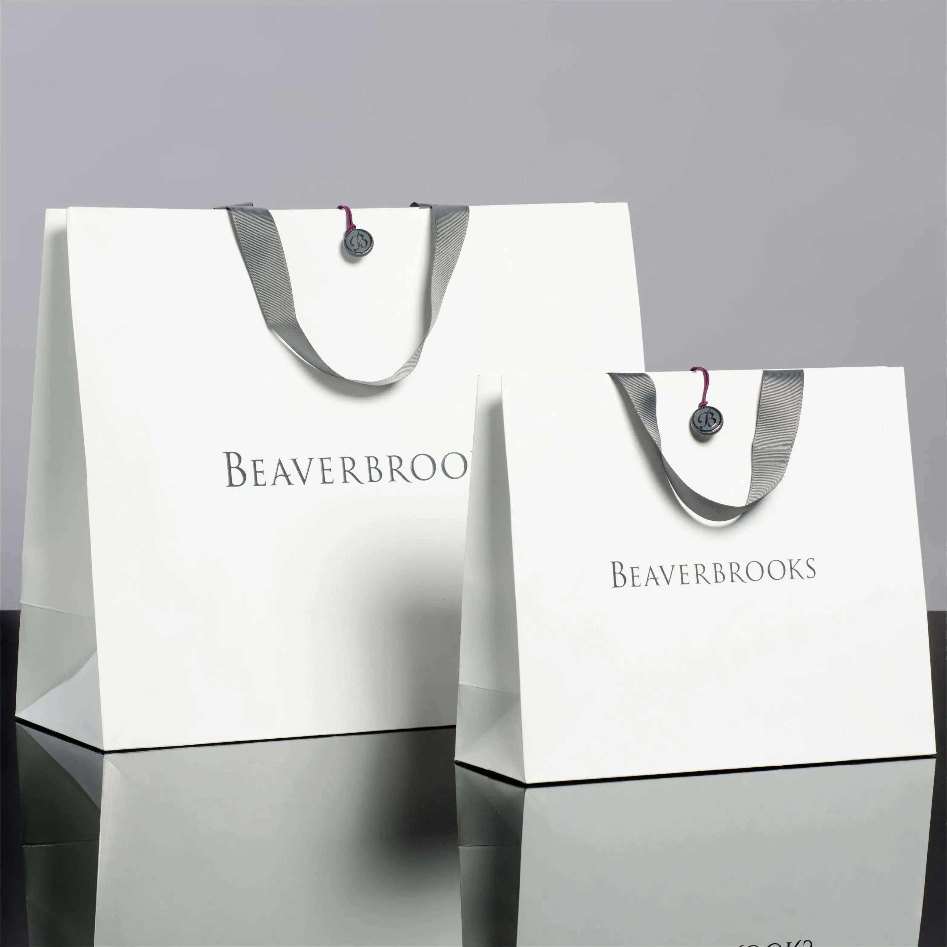 Bolsas de papel de lujo con logotipo personalizado impreso, embalaje de joyería, pulsera, bolsa de compras de regalo con cinta cerrada