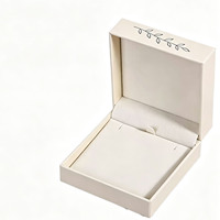 Boîte cadeau personnalisée en forme de livre ivoire à prix de gros avec impression d'art ligné et insert à languette, boîte rigide OEM