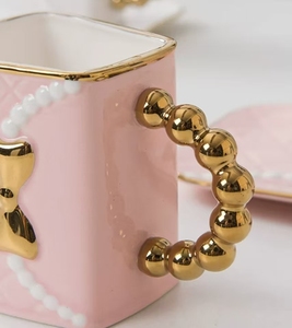 ถ้วยเซรามิคพร้อมจานรองลายโบว์ 350 มล. สไตล์ยุโรป หรูหรา คุณภาพสูง สำหรับดื่มชาและกาแฟยามบ่าย - Product Image 3