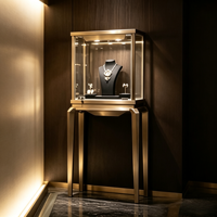 Vitrine à bijoux de luxe en métal doré avec éclairage LED, présentoir à bijoux en verre, meuble de présentation pour boutique de bijoux