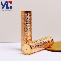 Tube à lèvres personnalisé Yuecai, gaufré 3D, motif floral, vide, finition or électroplaqué, luxueux, rond, pour baume à lèvres