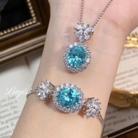 Set Perhiasan Fashion Wanita: Kalung Liontin Oval Bunga Salib Bertabur Berlian Penuh, Gelang Tembaga Warna Biru Laut Mint