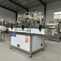 Machine de remplissage automatique de haute qualité pour huile d'olive en bouteille, prend en charge la personnalisation.