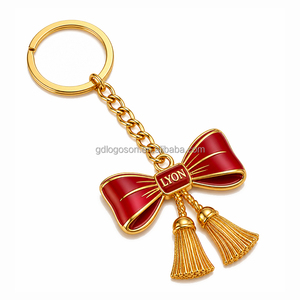 Porte-clés élégant personnalisé en métal émaillé, fabriqué en usine depuis 25 ans, avec nœud doré et pompon, breloque émail rouge, thème Lyon France, idéal pour les boutiques de souvenirs et comme cadeau de vacances - Product Image 1