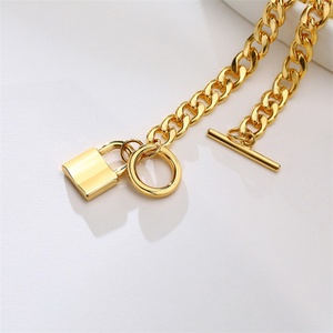 สร้อยข้อมือดีไซน์เนอร์ OT Clasp Lock Charms  วัสดุสแตนเลสสตีล 316L  แบบ Cuban Miami Link Chain สีทอง - Product Image 3