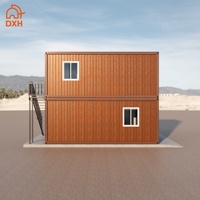 Maison conteneur modulaire préfabriquée démontable à deux étages en panneaux sandwich, personnalisée par l'usine DXH, pour appartement, école, villa