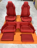 Vente en gros d'usine, housses de siège en fibre de carbone PU de haute qualité pour remplacement de sièges Ferrari avec cuir véritable rouge imperméable