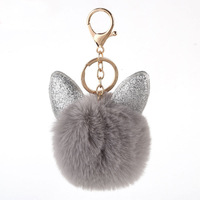 Porte-clés mignon avec pompon oreilles de lapin à paillettes, boule en fausse fourrure moelleuse, breloque pour sac femme, cadeau du Nouvel An chinois, pendentif en peluche
