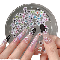 50 pièces/sac Breloques pour ongles 3D Kawaii, motifs floraux mixtes (fleurs à cinq pétales sculptées souples et lys colorés), transparents effet glace, pour décoration de manucure