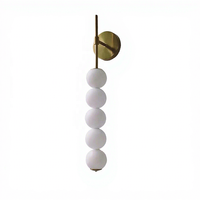 Lampe murale moderne nordique en fer avec bande LED et lumière chaude pour la décoration de la chambre à coucher et du salon