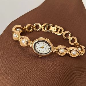 Nuovi Orologi <span class=keywords><strong>da</strong></span> <span class=keywords><strong>Polso</strong></span> Ovali <span class=keywords><strong>Vintage</strong></span> per Donna, Ragazza e Studentessa, Gioiello Bracciale con Perle - Product Image 1