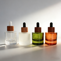 Bouteilles en verre ambré dépoli de luxe personnalisées à épaule plate de 30 ml (1 oz) pour huiles essentielles, flacons compte-gouttes en verre mat pour lotion corporelle