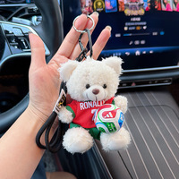 Porte-clés en peluche ours en peluche maillot d'équipe de football, pendentif mini ballon et sac, pour fans de stars de football, vente en gros