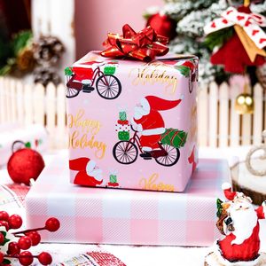 Papel de regalo navideño rosa con diseño divertido de Papá Noel en bicicleta, patrón reversible a cuadros, 17 pulgadas x 32.8 pies, para manualidades navideñas - Product Image 3