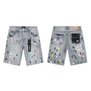 Pantalones cortos de mezclilla vintage con parches rotos, efecto salpicado de tinta y pedrería, estilo urbano de marca Purple, de corte cropped. - Product Image 4