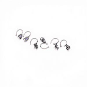 Accesorios Cold Wind Neutral Piercing: Anillos para Labios y Nariz de Acero Inoxidable 316, Impermeables, Hipoalergénicos, con Colgante de Diamante Araña - Product Image 2