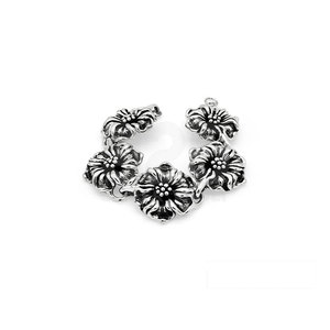 Bracelet en argent 925 avec un design floral détaillé et des centres à pois, de qualité supérieure - Product Image 1
