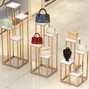 Kainice Boutique Shop Fittings Display Stand Handbag Store Interior Design Customized gold metal Display Table Bags Shop