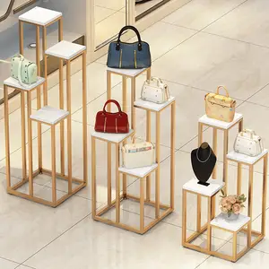 Kainice butik mağaza armatürleri ekran standı çanta mağazası iç tasarım özelleştirilmiş altın metal gösterge tablosu çanta mağazası