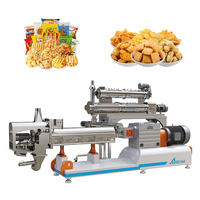 Machine à extrusion bivis pour la fabrication de snacks gonflés co-extrudés à cœur de crème