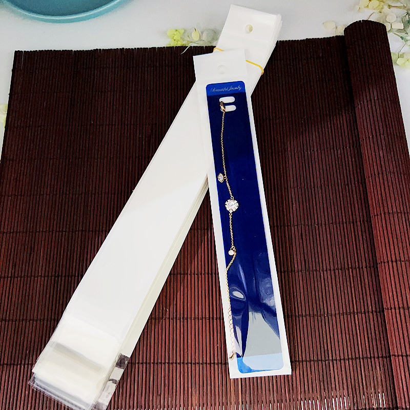 Sac 4*29 blanc, à l'exclusion des cartes et bracelets.