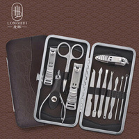 Ensemble de coupe-ongles Longhui 12 en 1 en acier inoxydable avec motif visage souriant, ensemble d'outils professionnels de manucure et de pédicure, kit pour les ongles