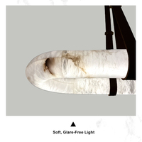 Lampe suspendue ovale longue en pierre d'albâtre naturelle avec LED, sangle en cuir et plaque supérieure en cuivre massif pour salle à manger et intérieur de maison