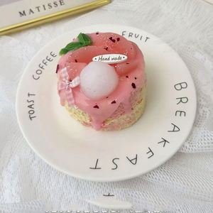 Vente directe usine : Jouet à presser en silicone de qualité alimentaire, série Gâteau Pêche Litchi, sûr pour tous les âges, anti-stress, couleurs vives - Product Image 1
