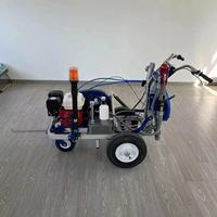 Machine de marquage routier à double pistolet pour peinture à froid, idéale pour les parkings, terrains de sport et les chantiers de construction