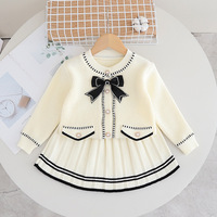 Ensemble de vêtements 2 pièces pour tout-petits, pull en acrylique tricoté à col rond avec nœud et jupe plissée douce pour bébés filles