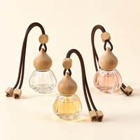 Vente en gros de flacons de parfum pour voiture vides de 8 ml, diffuseur de parfum en verre suspendu rechargeable avec bouchon en bois
