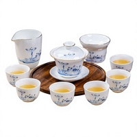 Service à thé en porcelaine de Jingdezhen pour usage domestique, vente en gros ; Ensemble de 8 pièces de style national bleu et blanc, comprenant tasses à thé Gongfu et bol à couvercle, idéal