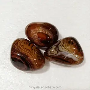 Artesanato de cristal de cura, carneiro vermelho de quartzo natural sardonyx agate palmeira à venda