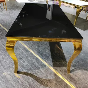 까만 유리제 정상을 가진 호화스러운 금 구조 스테인리스 장방형 테이블