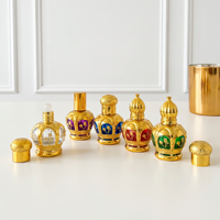Flacon de parfum octogonal fin de 12 ml en verre avec bouchon à vis doré et applicateur à bille pour huile d'attar rechargeable, avec carton
