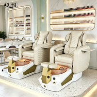 Fauteuil de pédicure électrique de luxe moderne pour salon, avec massage et drainage automatique, idéal pour manucure et soins des pieds.