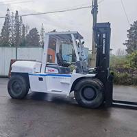 Forklift Diesel 4WD TCM FD100 Bekas, Kualitas Terjamin, Mast Dua Tingkat 4.5m, Ban Solid, Aksesoris Opsional
