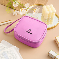 Logo personnalisé d'usine nouvelle couleur unie petit rouge à lèvres sac de rangement Mini PU cuir maquillage cosmétique pochette Portable fermeture éclair échantillon gratuit