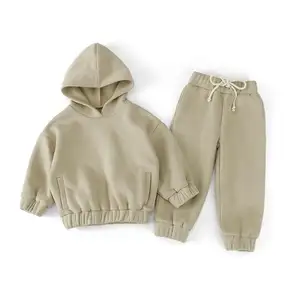 Korean version of boys and girls' winter clothing new set solid color fleece hooded sweater leggings, casual children's set