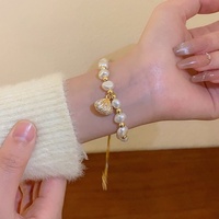 Bracelet en perles d'eau douce baroques, forme animale, style français, élégant et polyvalent, coquillage, haut de gamme, légèrement luxueux, pierre œil-de-chat