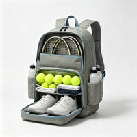 Sac à dos de tennis gris avec garniture bleue, sac de raquette, sac à balles doublé, poche zippée, poche latérale, sac à usage spécial personnalisable