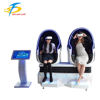 Chaise commerciale d'oeufs de VR à 2 places 9D simulateur de cinéma station de jeu de réalité virtuelle centres commerciaux extérieurs à pièces fabriqués sur PC