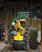 Cour extérieure jardin rocaille fontaine à eau qui coule ornements maison intérieur salon balcon terrasse eau paysage décor