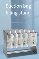 GFK280-1Nozzle Machine de remplissage de liquides électrique CNC semi-automatique de haute précision en acier inoxydable pour sachets de boissons, économique