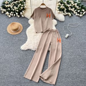 <strong>Women's</strong> Solid Casual Two Piece Pants Set <strong>Short</strong> Sleeve Top and Wide Leg <strong>Trousers</strong> with Metal Decor Elegant Loungewear Suit - Product Image 1